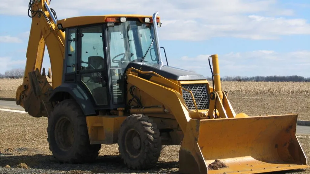 Ce este un buldoexcavator și din ce este compus?